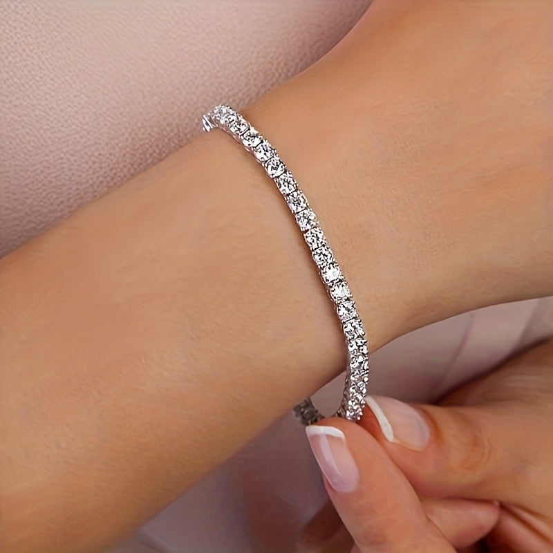 Bracciale tennis in oro bianco e cristalli