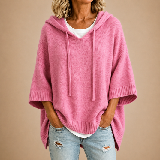 Poncho in maglia con cappuccio rosa
