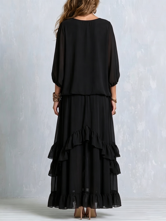 Elvira | Set composto da top nero in chiffon con scollo a V e frange, abbinato a gonna a balze a strati