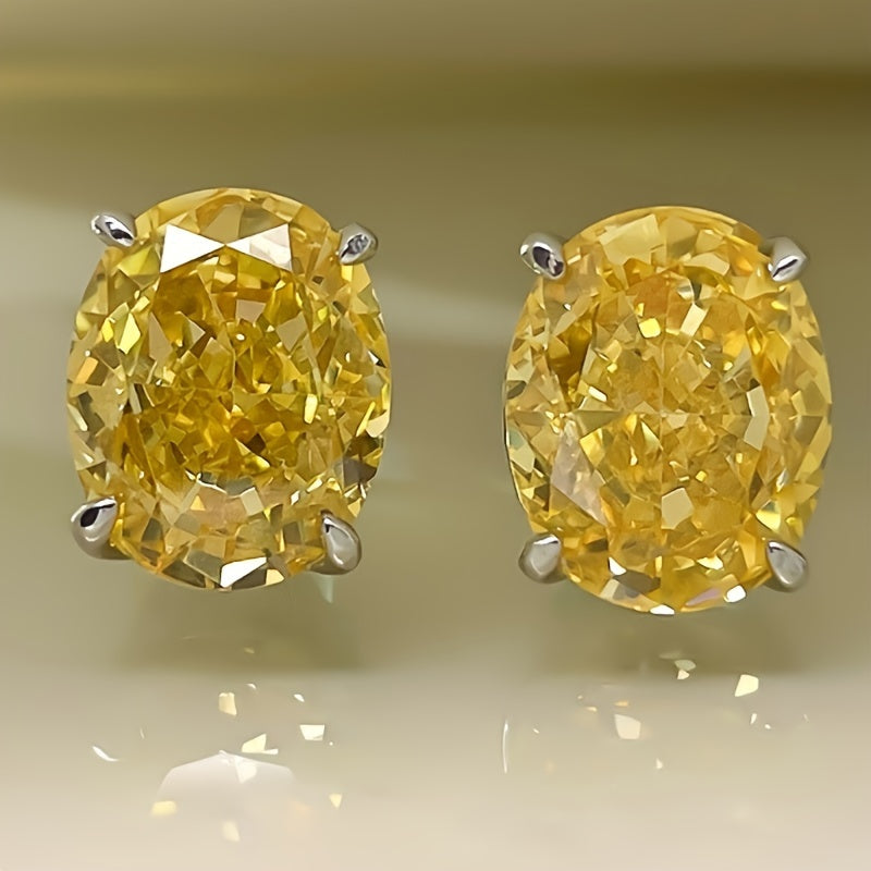 Orecchini Eterni in Oro Bianco con Zirconia