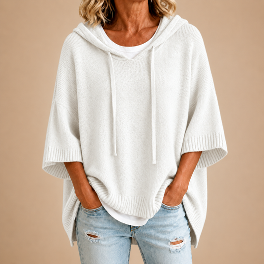 Poncho in maglia con cappuccio bianco
