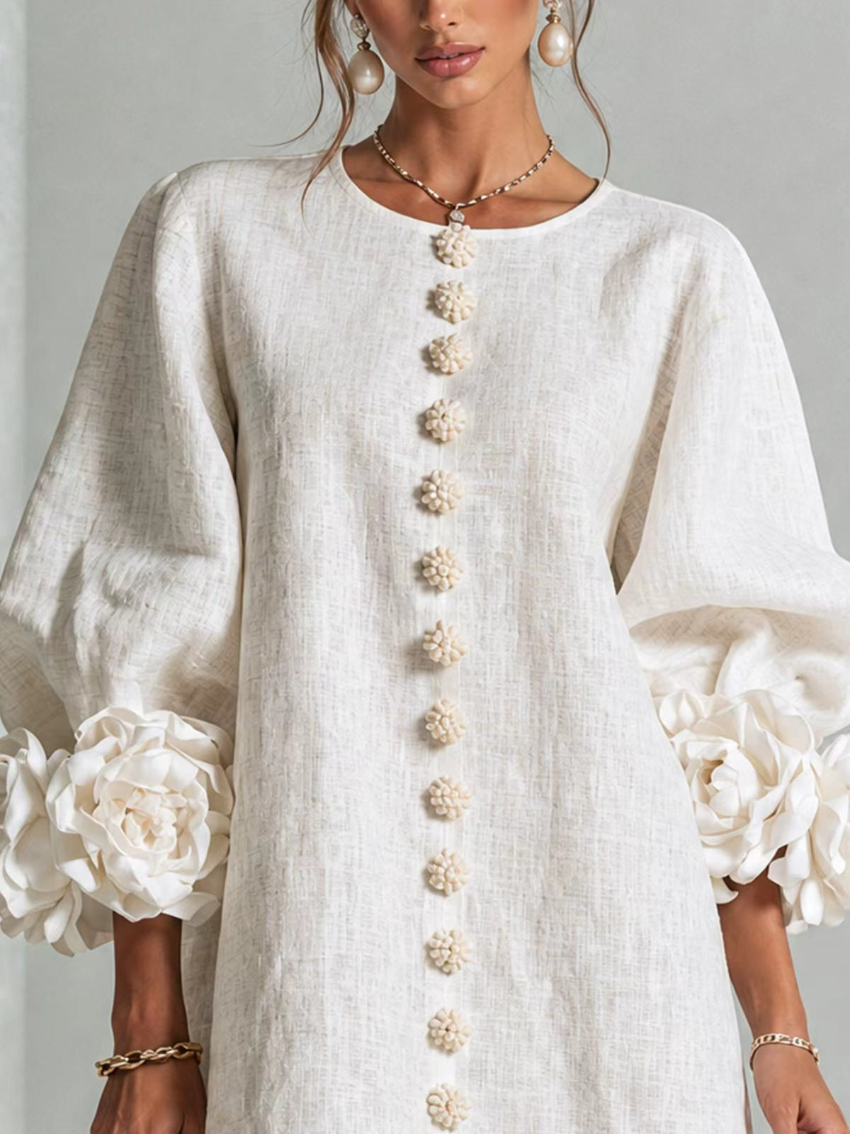 Vestito floreale con maniche a sbuffo e scollo rotondo
